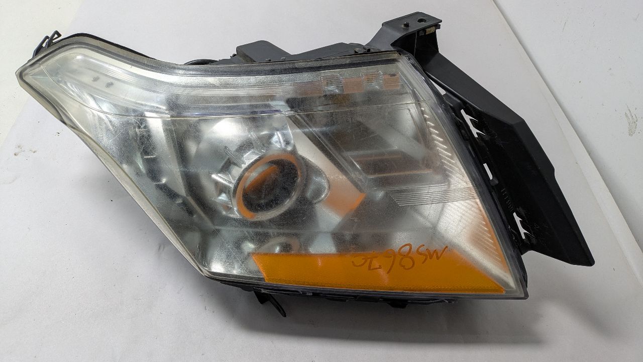 2011 CADILLAC SRX Left HEADLAMP ASSEMBLY - 401633 — photo 1