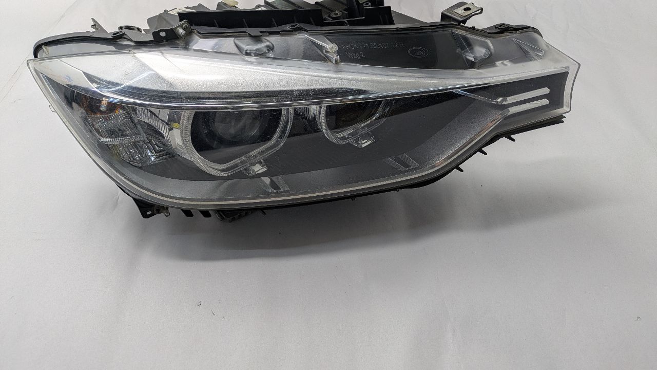 2013 BMW 328i Left HEADLAMP ASSEMBLY - 479645 — photo 1